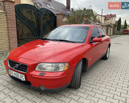 Красный Вольво С60, объемом двигателя 2.5 л и пробегом 260 тыс. км за 6800 $, фото 1 на Automoto.ua