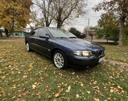 Синий Вольво С60, объемом двигателя 2.4 л и пробегом 315 тыс. км за 3900 $, фото 1 на Automoto.ua