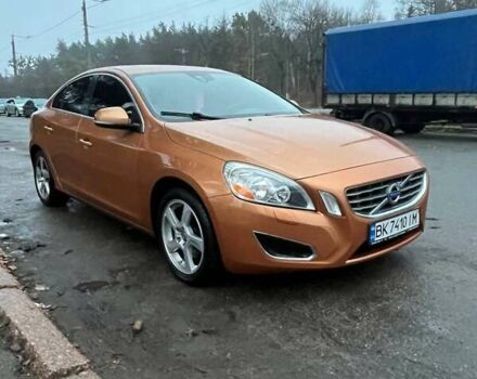 Оранжевый Вольво С60, объемом двигателя 2.5 л и пробегом 234 тыс. км за 11100 $, фото 1 на Automoto.ua
