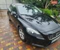 Чорний Вольво V40, об'ємом двигуна 2 л та пробігом 210 тис. км за 10500 $, фото 1 на Automoto.ua
