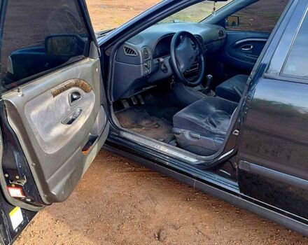 Чорний Вольво V40, об'ємом двигуна 1.8 л та пробігом 315 тис. км за 3800 $, фото 7 на Automoto.ua