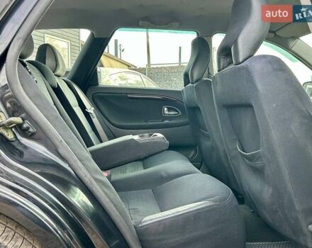 Черный Вольво В40, объемом двигателя 1.9 л и пробегом 240 тыс. км за 3500 $, фото 26 на Automoto.ua