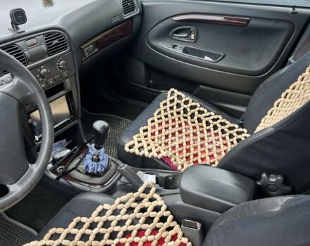 Черный Вольво В40, объемом двигателя 1.9 л и пробегом 300 тыс. км за 4000 $, фото 4 на Automoto.ua