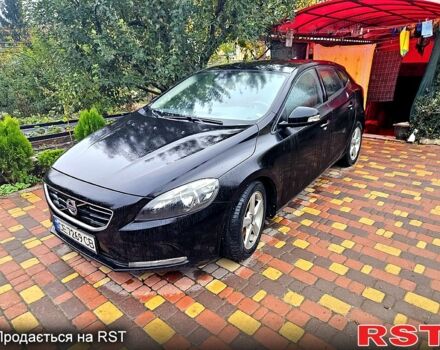 Чорний Вольво V40, об'ємом двигуна 2 л та пробігом 210 тис. км за 10500 $, фото 1 на Automoto.ua