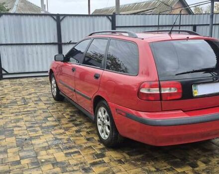 Червоний Вольво V40, об'ємом двигуна 1.95 л та пробігом 220 тис. км за 3900 $, фото 2 на Automoto.ua