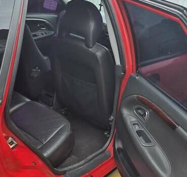 Червоний Вольво V40, об'ємом двигуна 1.95 л та пробігом 220 тис. км за 3900 $, фото 6 на Automoto.ua