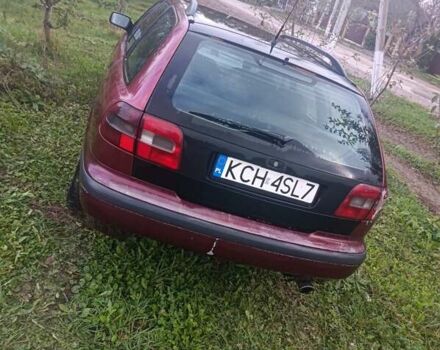 Красный Вольво В40, объемом двигателя 1.8 л и пробегом 322 тыс. км за 1300 $, фото 1 на Automoto.ua