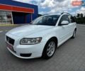 Білий Вольво V50, об'ємом двигуна 2 л та пробігом 285 тис. км за 9150 $, фото 1 на Automoto.ua
