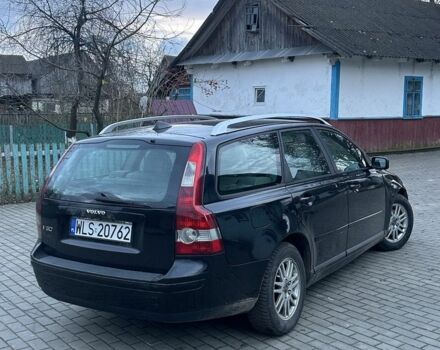 Черный Вольво В50, объемом двигателя 1.6 л и пробегом 239 тыс. км за 2600 $, фото 1 на Automoto.ua