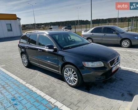Черный Вольво В50, объемом двигателя 1.56 л и пробегом 358 тыс. км за 7679 $, фото 1 на Automoto.ua