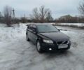 Черный Вольво В50, объемом двигателя 1.56 л и пробегом 225 тыс. км за 6200 $, фото 1 на Automoto.ua