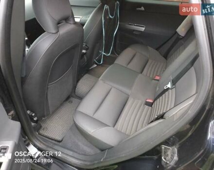 Черный Вольво В50, объемом двигателя 1.56 л и пробегом 253 тыс. км за 7200 $, фото 14 на Automoto.ua