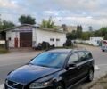 Черный Вольво В50, объемом двигателя 1.6 л и пробегом 217 тыс. км за 5600 $, фото 1 на Automoto.ua