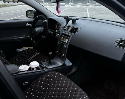 Черный Вольво В50, объемом двигателя 1.56 л и пробегом 282 тыс. км за 5299 $, фото 11 на Automoto.ua