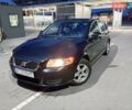 Черный Вольво В50, объемом двигателя 1.56 л и пробегом 261 тыс. км за 7200 $, фото 1 на Automoto.ua