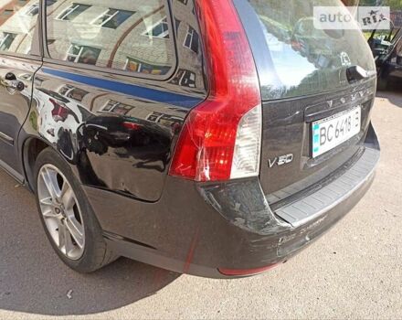 Черный Вольво В50, объемом двигателя 1.56 л и пробегом 297 тыс. км за 6300 $, фото 4 на Automoto.ua