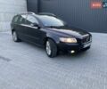Черный Вольво В50, объемом двигателя 1.56 л и пробегом 235 тыс. км за 6990 $, фото 1 на Automoto.ua