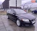 Черный Вольво В50, объемом двигателя 1.56 л и пробегом 233 тыс. км за 6000 $, фото 1 на Automoto.ua