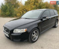 Черный Вольво В50, объемом двигателя 1.56 л и пробегом 247 тыс. км за 6500 $, фото 1 на Automoto.ua