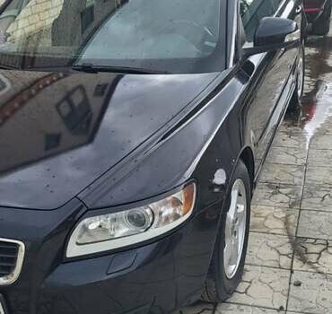 Черный Вольво В50, объемом двигателя 1.6 л и пробегом 160 тыс. км за 9300 $, фото 1 на Automoto.ua