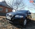 Чорний Вольво V50, об'ємом двигуна 1.56 л та пробігом 283 тис. км за 7900 $, фото 1 на Automoto.ua