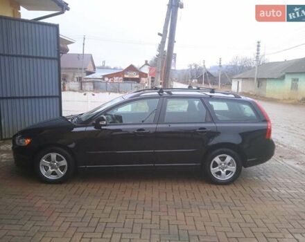 Чорний Вольво V50, об'ємом двигуна 1.56 л та пробігом 262 тис. км за 7799 $, фото 1 на Automoto.ua