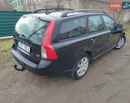 Чорний Вольво V50, об'ємом двигуна 1.6 л та пробігом 245 тис. км за 7500 $, фото 2 на Automoto.ua