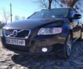 Черный Вольво В50, объемом двигателя 1.6 л и пробегом 186 тыс. км за 9000 $, фото 1 на Automoto.ua