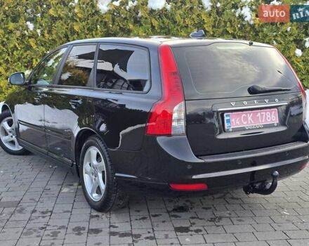 Черный Вольво В50, объемом двигателя 1.6 л и пробегом 192 тыс. км за 8599 $, фото 92 на Automoto.ua