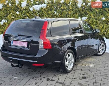 Черный Вольво В50, объемом двигателя 1.6 л и пробегом 192 тыс. км за 8599 $, фото 77 на Automoto.ua