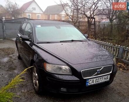 Черный Вольво В50, объемом двигателя 1.6 л и пробегом 250 тыс. км за 6000 $, фото 1 на Automoto.ua