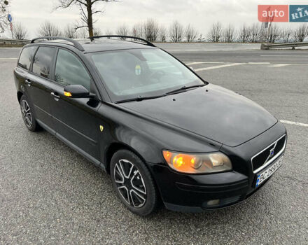 Черный Вольво В50, объемом двигателя 1.8 л и пробегом 275 тыс. км за 4299 $, фото 1 на Automoto.ua