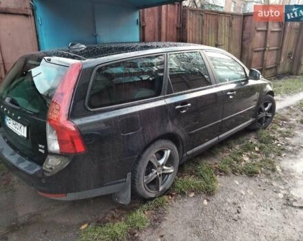 Чорний Вольво V50, об'ємом двигуна 1.6 л та пробігом 260 тис. км за 7300 $, фото 1 на Automoto.ua