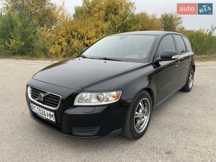 Черный Вольво В50, объемом двигателя 1.56 л и пробегом 246 тыс. км за 6500 $, фото 1 на Automoto.ua