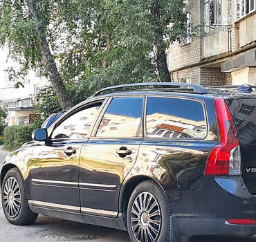 Черный Вольво В50, объемом двигателя 1.6 л и пробегом 250 тыс. км за 5800 $, фото 1 на Automoto.ua