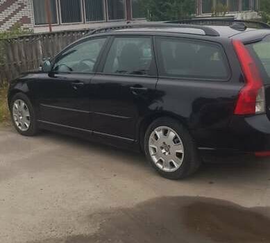 Черный Вольво В50, объемом двигателя 1.6 л и пробегом 254 тыс. км за 6900 $, фото 1 на Automoto.ua