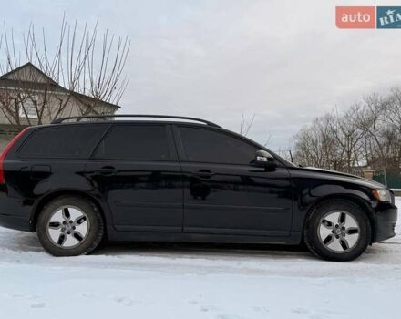 Черный Вольво В50, объемом двигателя 1.56 л и пробегом 220 тыс. км за 7300 $, фото 1 на Automoto.ua