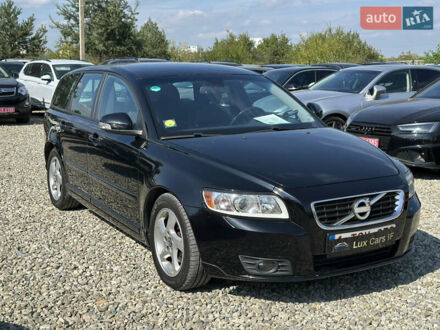Черный Вольво В50, объемом двигателя 1.6 л и пробегом 259 тыс. км за 7800 $, фото 1 на Automoto.ua