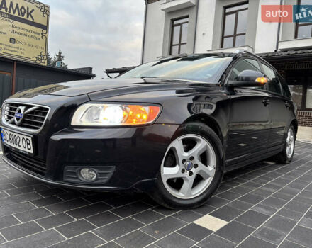 Черный Вольво В50, объемом двигателя 1.56 л и пробегом 256 тыс. км за 8300 $, фото 1 на Automoto.ua