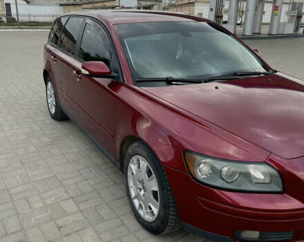 Красный Вольво В50, объемом двигателя 2 л и пробегом 309 тыс. км за 5500 $, фото 1 на Automoto.ua