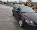 Червоний Вольво V50, об'ємом двигуна 2 л та пробігом 250 тис. км за 3350 $, фото 1 на Automoto.ua