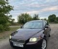 Красный Вольво В50, объемом двигателя 1.56 л и пробегом 325 тыс. км за 4699 $, фото 1 на Automoto.ua
