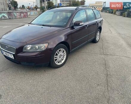 Червоний Вольво V50, об'ємом двигуна 1.56 л та пробігом 326 тис. км за 7300 $, фото 1 на Automoto.ua