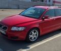 Красный Вольво В50, объемом двигателя 2.4 л и пробегом 302 тыс. км за 7400 $, фото 1 на Automoto.ua