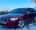 Красный Вольво В50, объемом двигателя 1.6 л и пробегом 252 тыс. км за 5890 $, фото 1 на Automoto.ua