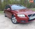 Красный Вольво В50, объемом двигателя 1.6 л и пробегом 288 тыс. км за 6850 $, фото 1 на Automoto.ua