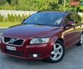 Червоний Вольво V50, об'ємом двигуна 2 л та пробігом 229 тис. км за 9999 $, фото 1 на Automoto.ua