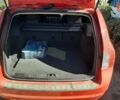Красный Вольво В50, объемом двигателя 1.56 л и пробегом 200 тыс. км за 9000 $, фото 1 на Automoto.ua