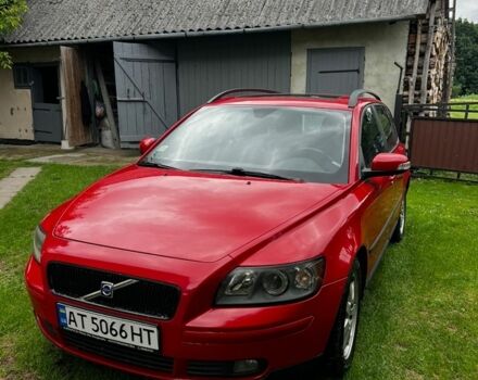 Червоний Вольво V50, об'ємом двигуна 2 л та пробігом 244 тис. км за 5900 $, фото 1 на Automoto.ua