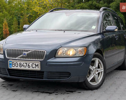 Синий Вольво В50, объемом двигателя 1.56 л и пробегом 312 тыс. км за 5200 $, фото 1 на Automoto.ua